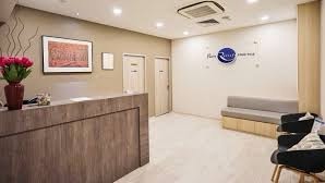 Reception desk and waiting area at The Pain Relief Practice